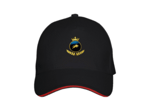 Black Premium Maison Luxe Investor Black Crown Cap front view with crest logo and red trim on a yellow background.